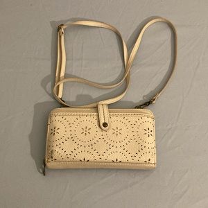 The Sak zippered wallet with shoulder strap